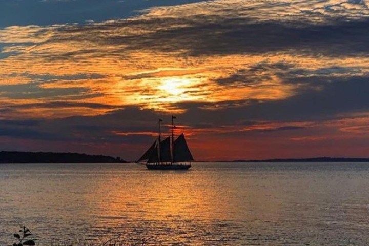 a sunset over a body of water