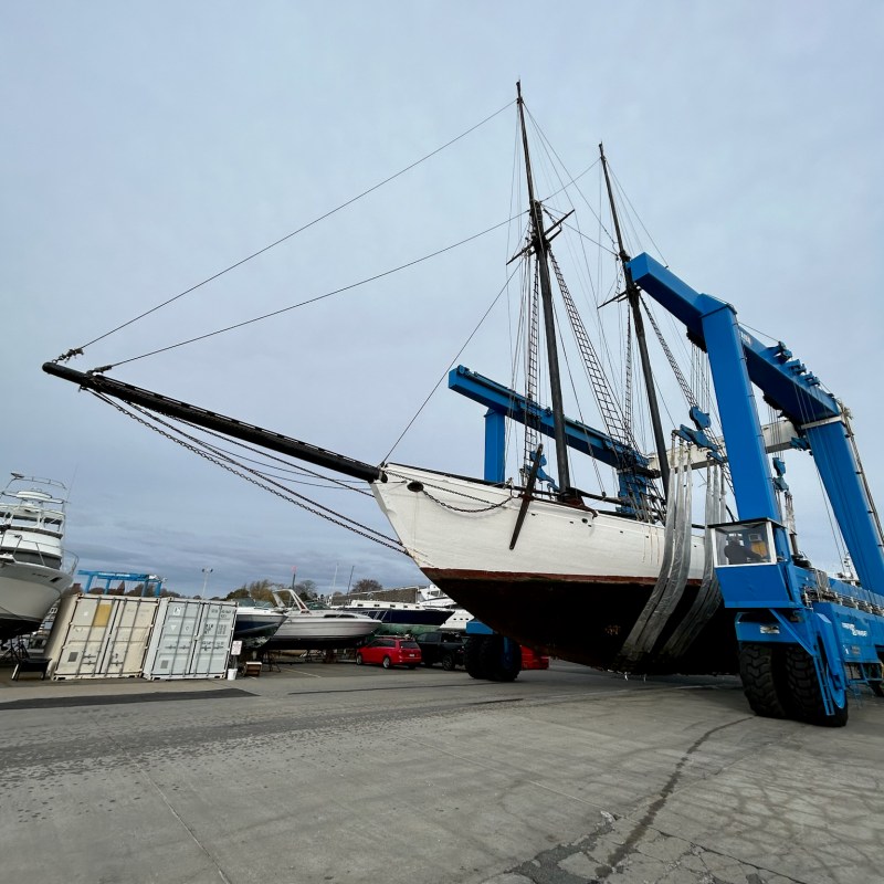 a boat parked on the beach